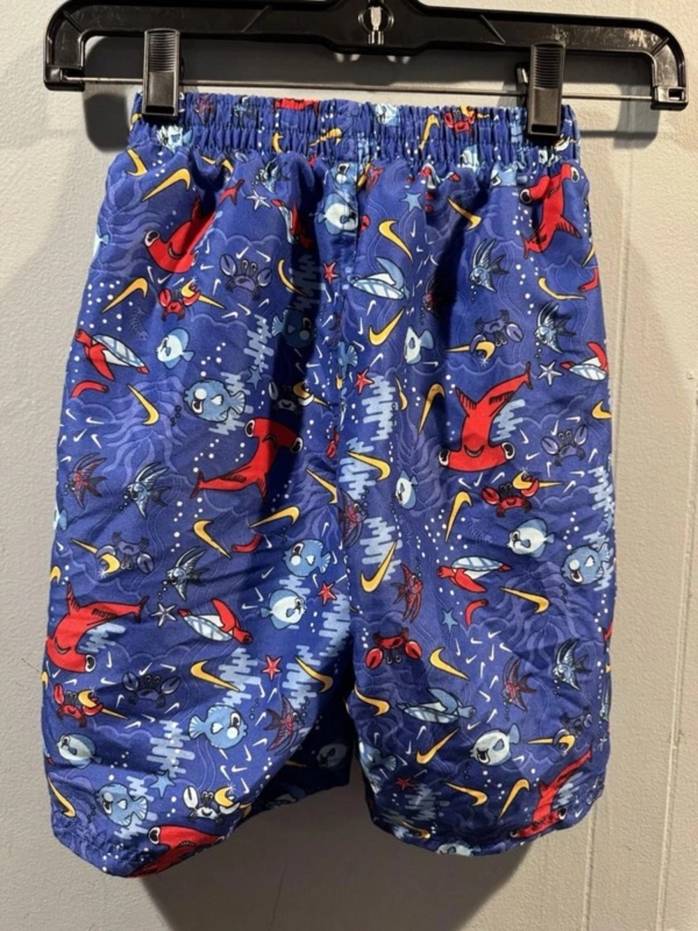 Nike Blue Swim Shorts with Red Lining and Accents